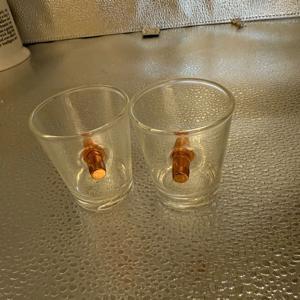 Lucky shot bullet through shot glasses